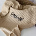 Pletena pamučna dekica AirCotton sa kićankama - Bež